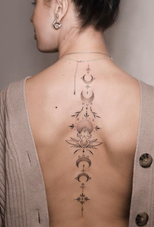 celestial spine tattoo